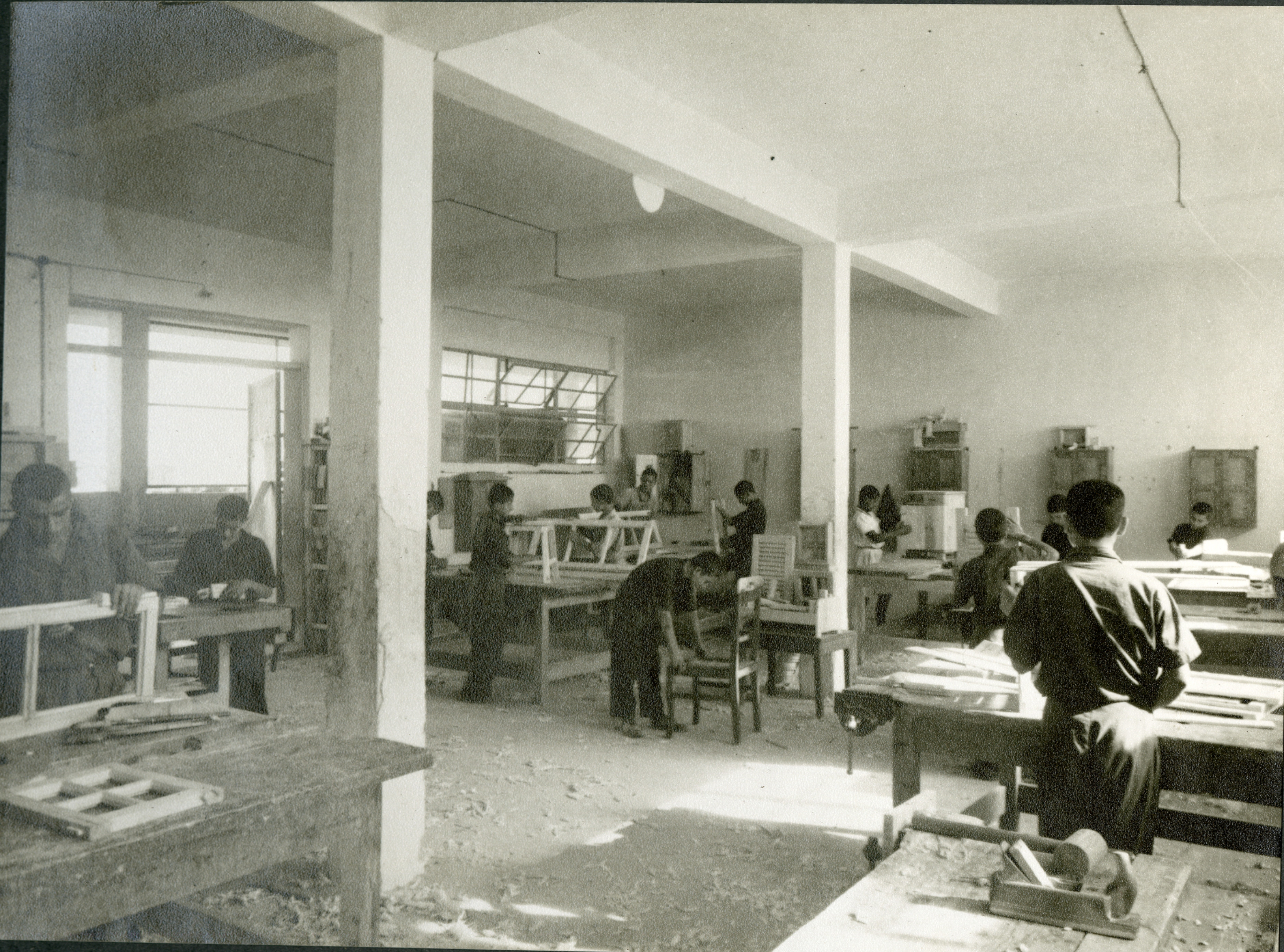 Figure 6. Carpentry workshop at the Alami Farm School. Students engaged in woodwork, one of the vocational training programmes offered at the school. Photograph Album The Arab Development Society, Jericho-Jordan, Middle East Centre Archive, St Antony’s College, Oxford (5/1/25)